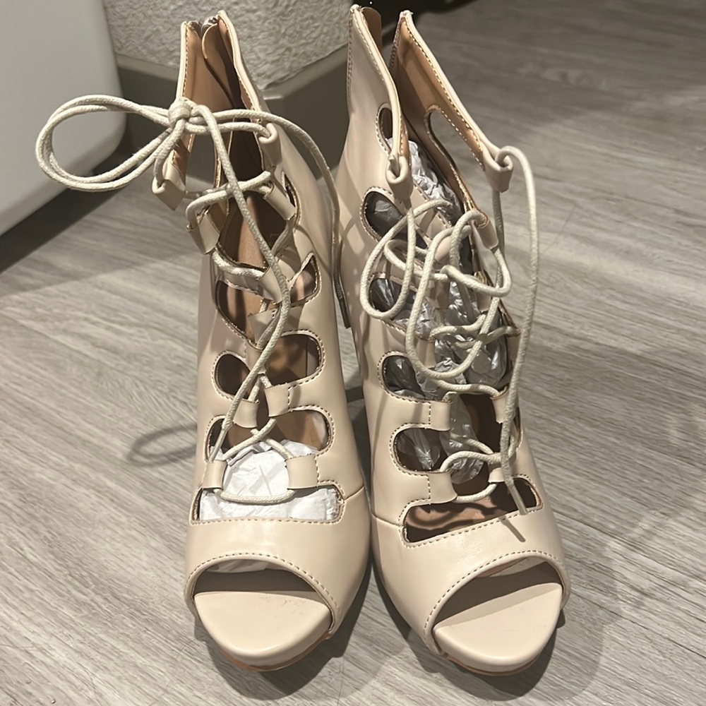 FashionNova strappy high heels.